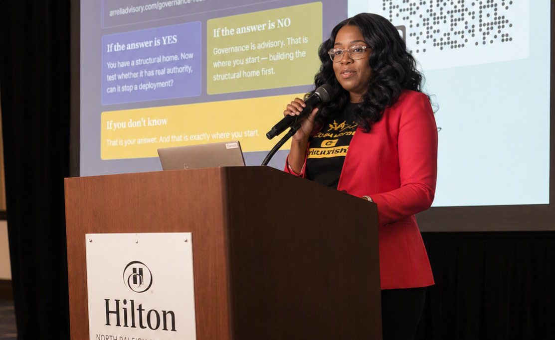 Dr. Gbemisola Adetayo delivering a keynote at the Hilton North Raleigh conference